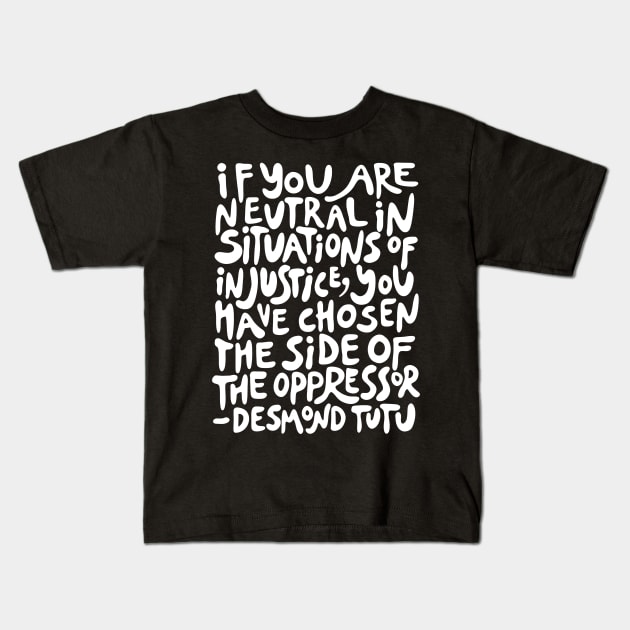 if you are neutral in situations of injustice you have chosen the side of the oppressor (activist quote in groovy white) Kids T-Shirt by acatalepsys 